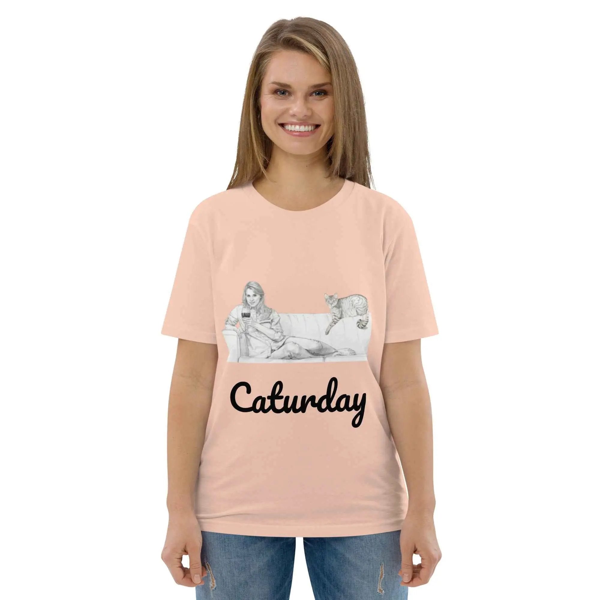 Unisex Caturday Women's T-Shirt by Stanley/Stella made from organic cotton, featuring a front graphic in a fresh peach color.