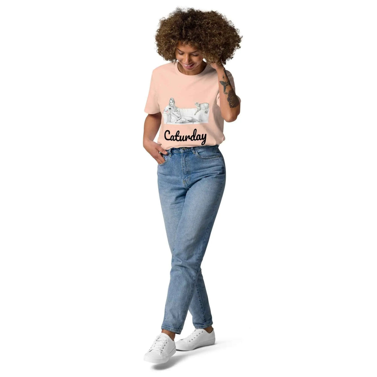 Unisex Caturday Women's T-Shirt by Stanley/Stella made of organic cotton, featuring a front design in fresh peach color.